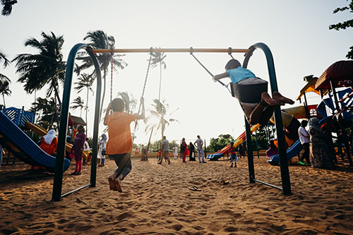 Children on swings at a park